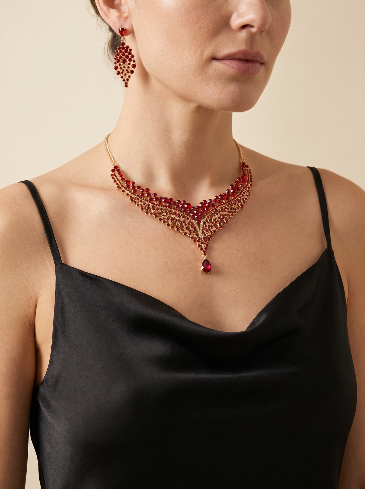 La Corona necklace and earring set worn by a model — FYNX