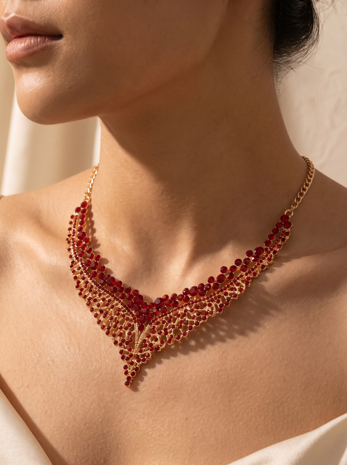 La Corona filigree collar close-up on the collarbone — FYNX