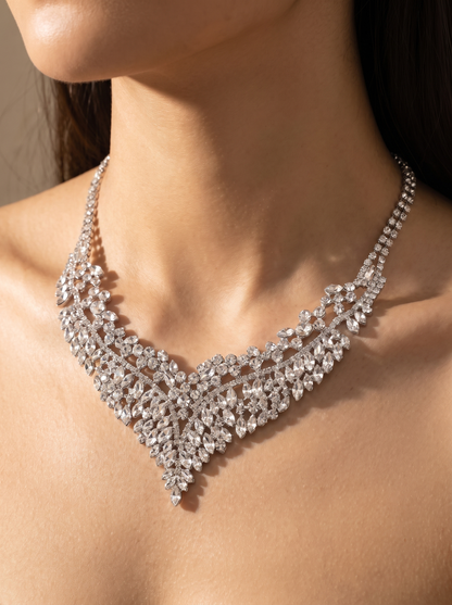 La Regina crystal collar close-up on the collarbone — FYNX