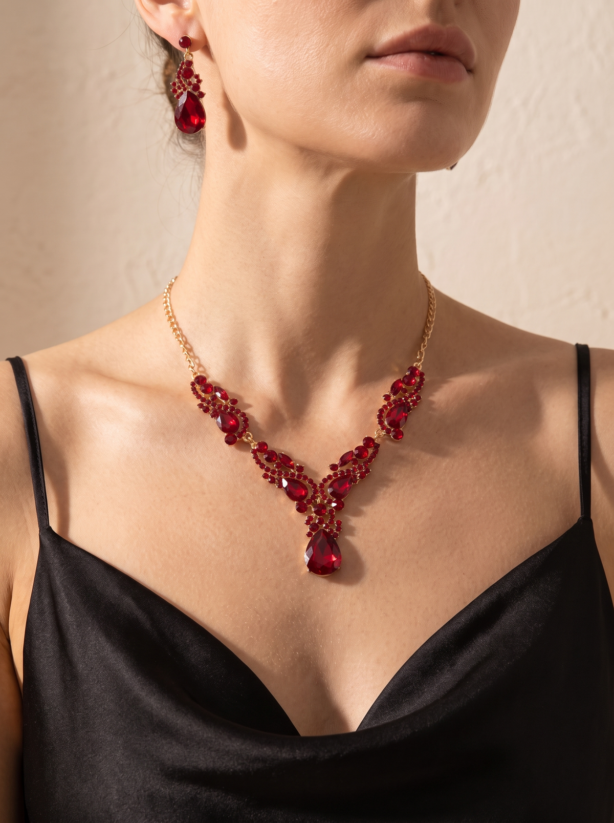 La Fiamma necklace and earring set worn by a model — FYNX