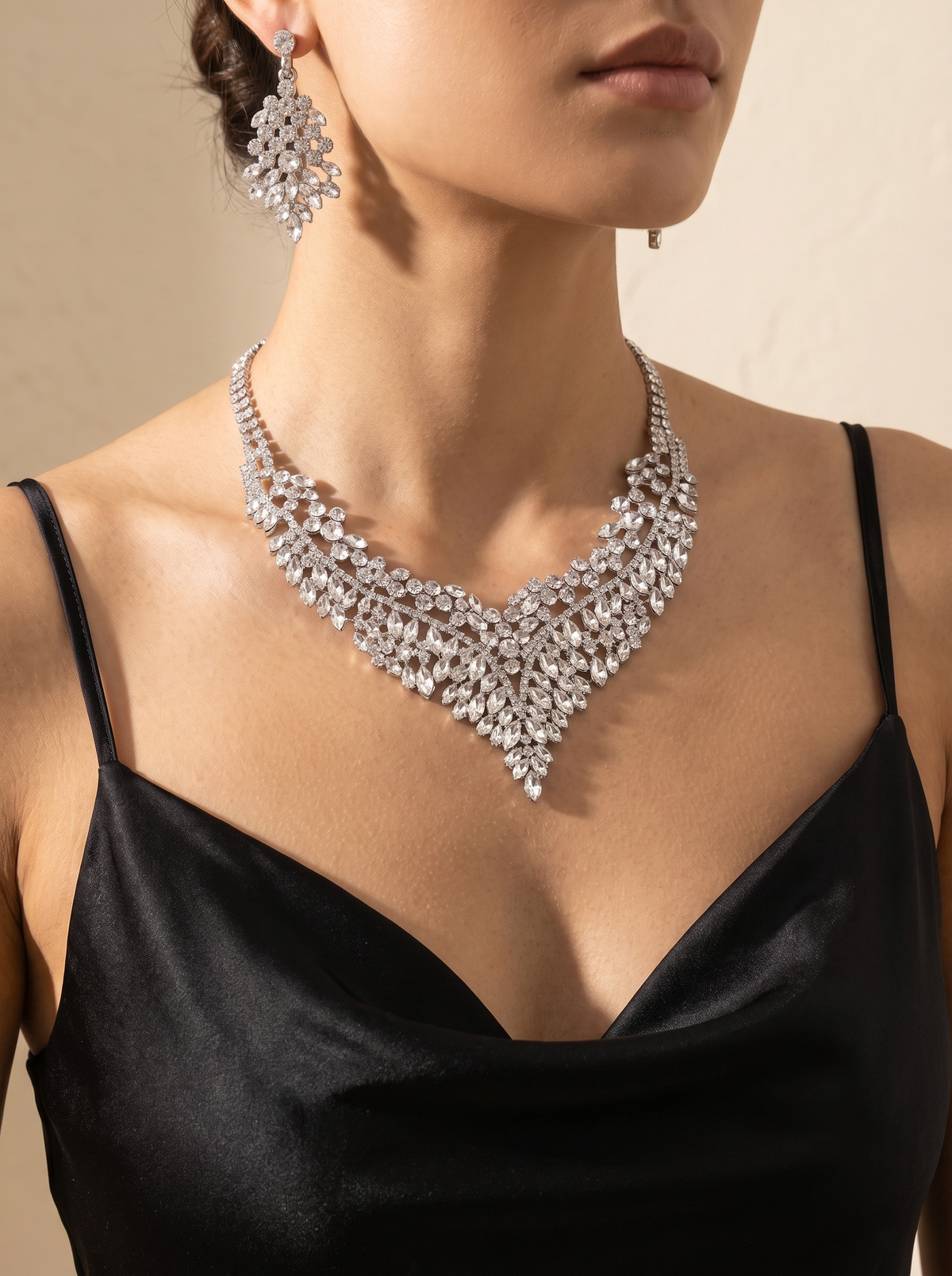 La Regina statement necklace and earring set worn by a model — FYNX