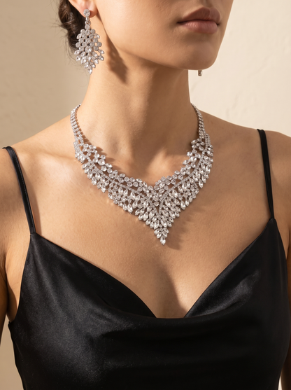 La Regina statement necklace and earring set worn by a model — FYNX